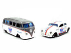 Volkswagen Samba Bus Dark Gray Metallic and White with Volkswagen Beetle White Metallic and Enclosed Car Trailer Silver "Toyo Tires" "Team Haulers" Series 1/64 Diecast Model Cars by Maisto