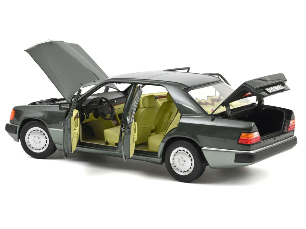 1990 Mercedes-Benz 230 E Night Green Metallic with Green Interior 1/18 Diecast Model Car by Norev-0