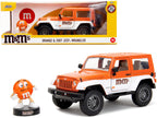 2007 Jeep Wrangler Orange Metallic and White and Orange M&M Diecast Figure "M&M's" "Hollywood Rides" Series 1/24 Diecast Model Car by Jada-0