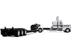 Peterbilt 389 with 36" Flat Top Sleeper and Fontaine Magnitude Lowboy Trailer White with Black Stripes 1/64 Diecast Model by DCP/First Gear