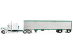 Peterbilt 389 with 63" Mid-Roof Sleeper and 53' Utility Trailer White with Green Stripes 1/64 Diecast Model by DCP/First Gear-2