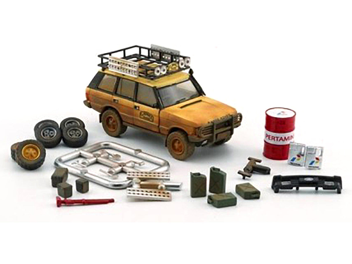 Land Rover Range Rover Classic LSE RHD (Right Hand Drive) "Camel Trophy" Yellow (Dirty Mud Version) with Roof Rack Extra Wheels and Accessories Limited Edition to 2016 pieces Worldwide 1/64 Diecast Model Car by BM Creations-1