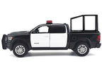 2019 RAM 1500 Laramie Crew Cab Pickup Truck with Bed Cage Black and White with Flashing Light Bar and Front and Rear Lights and Sounds 1/27 Diecast Model Car by Motormax-2