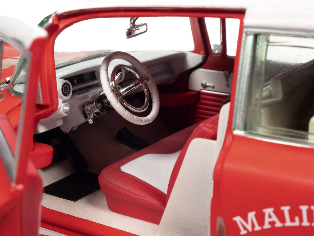 1959 Cadillac Eldorado Ambulance Red with White Top "Malibu Beach Rescue" (Weathered) with Surfboards on Roof "Surf Shark" 1/18 Diecast Model Car by Auto World-3