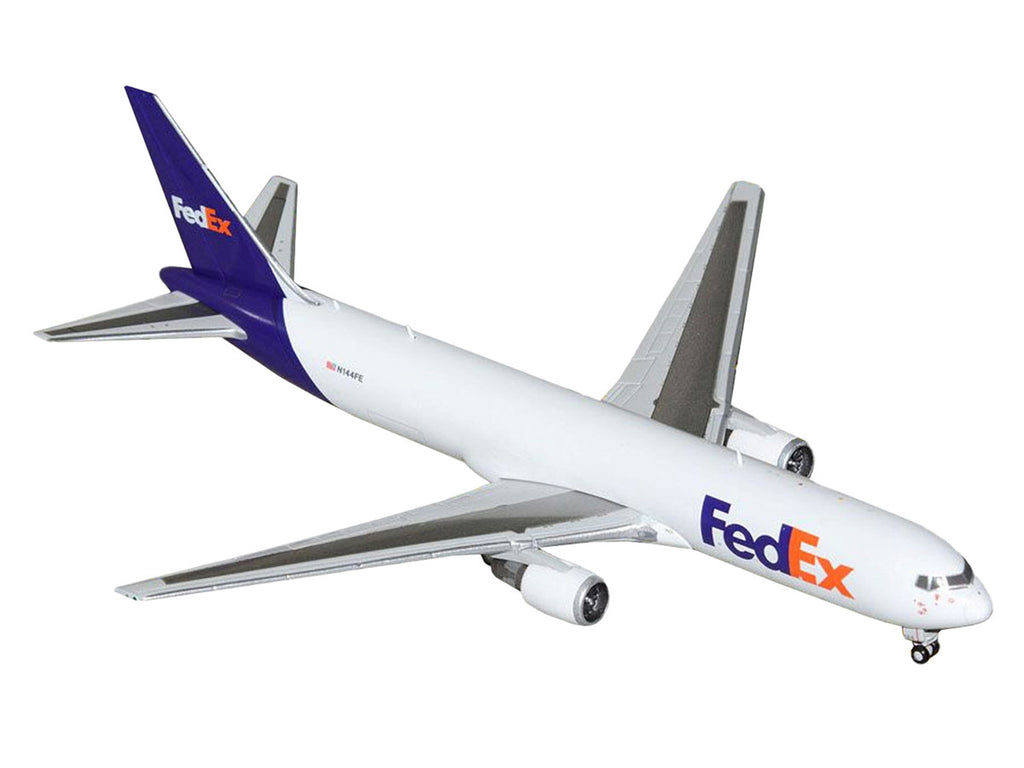Boeing 767-300F Commercial Aircraft "FedEx (Federal Express)" (N144FE) White with Purple Tail 1/400 Diecast Model Airplane by GeminiJets-1
