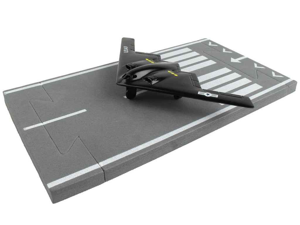 Northrop Grumman B-2 Spirit Stealth Aircraft Black "United States Air Force" with Runway Section Diecast Model Airplane by Runway24-1
