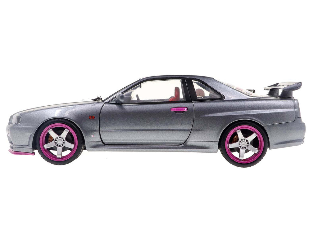1999 Nissan Skyline GT-R (R34) RHD (Right Hand Drive) Silver Metallic with Purple Wheels 1/18 Diecast Model Car by Solido-1