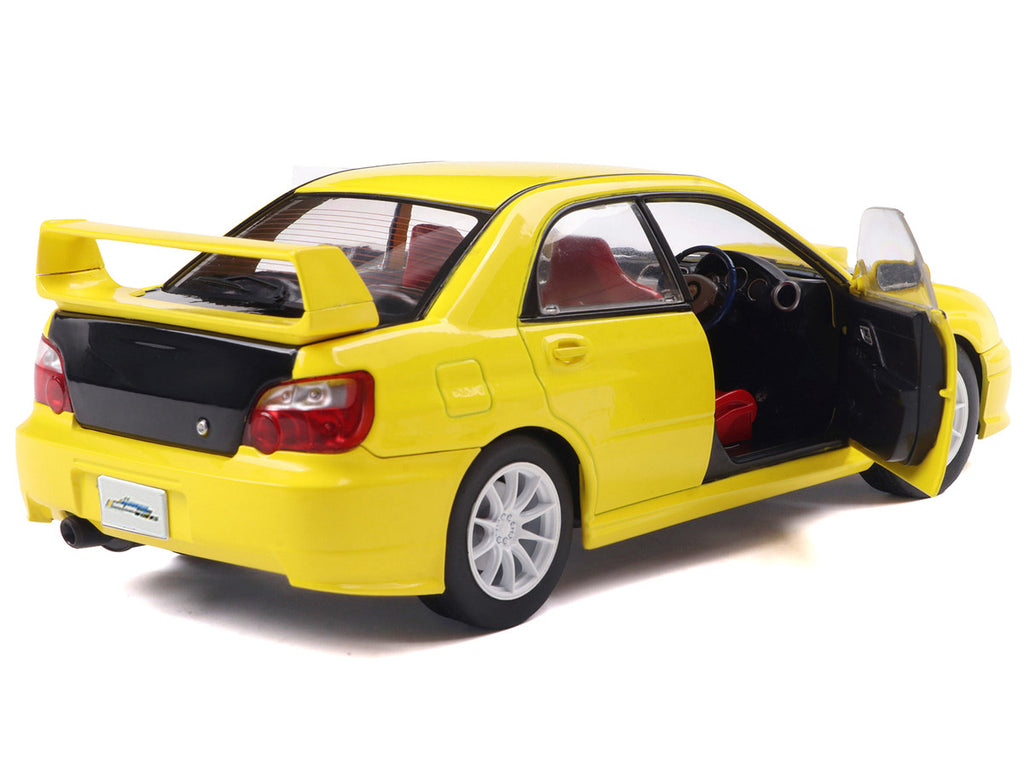 2003 Subaru Impreza WRX STI RHD (Right Hand Drive) Yellow with Carbon Hood 1/18 Diecast Model Car by Solido-2