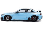 2024 BMW M2 Performance Parts Zandvoort Blue with Carbon Top and Black Stripes 1/18 Diecast Model Car by Solido